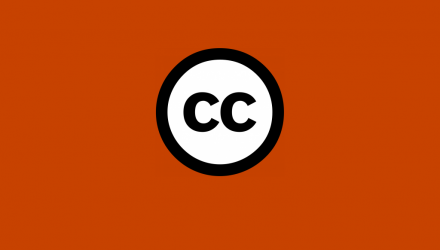 The Creative Commons' 'CC in a circle' icon in the centre of a tomato (red) background.